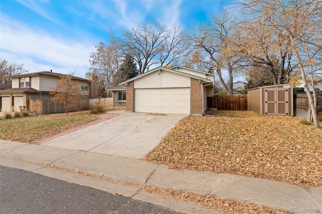 view of front of home featuring a garage and a storage shed