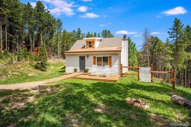 9092 Gray Ln, Conifer, CO 80433 - view of front facade with a chimney