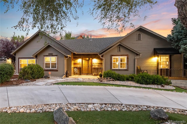 ranch-style home with covered porch