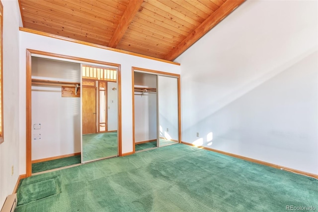 unfurnished bedroom featuring multiple closets, lofted ceiling with beams, baseboard heating, carpet flooring, and baseboards