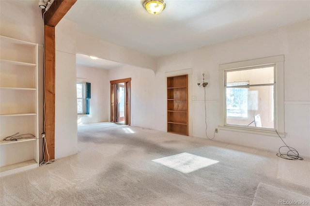 unfurnished room featuring carpet floors