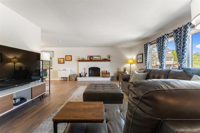 6170 Castlewood Ln, Colorado Springs, CO 80918 - living room with wood finished floors and a fireplace