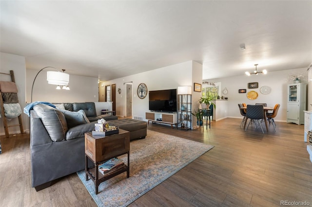 6170 Castlewood Ln, Colorado Springs, CO 80918 - living area with wood finished floors and a chandelier