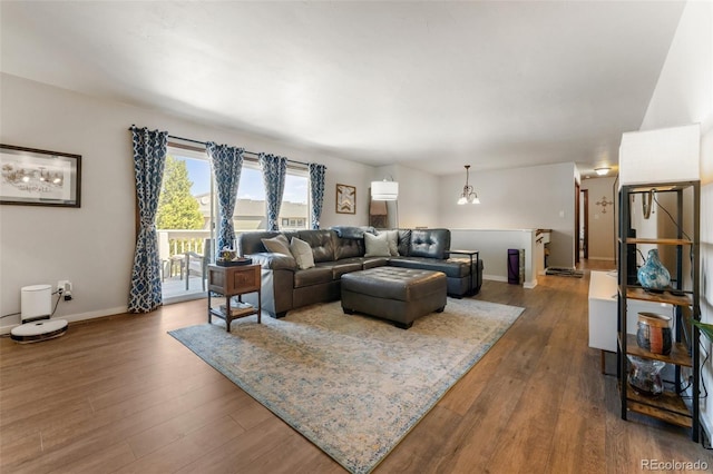 6170 Castlewood Ln, Colorado Springs, CO 80918 - living area featuring wood finished floors and baseboards