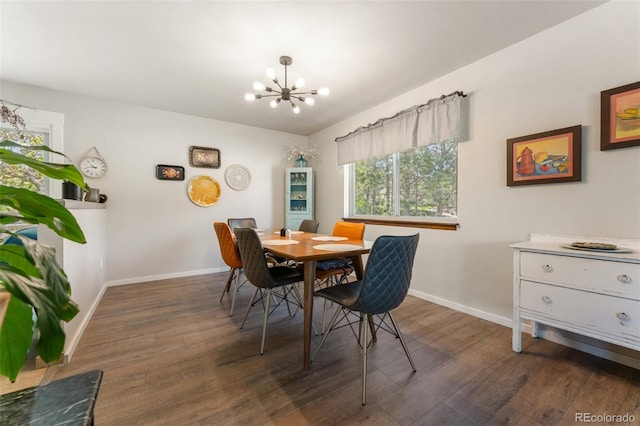 6170 Castlewood Ln, Colorado Springs, CO 80918 - dining area with wood finished floors and a chandelier