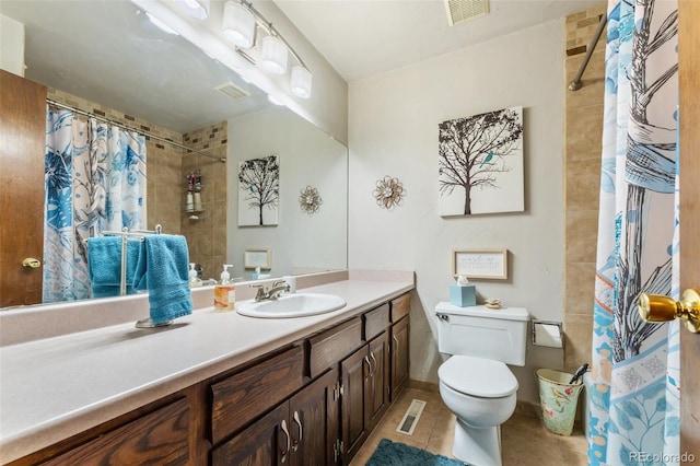 6170 Castlewood Ln, Colorado Springs, CO 80918 - bathroom with tile patterned floors, vanity, and tiled shower