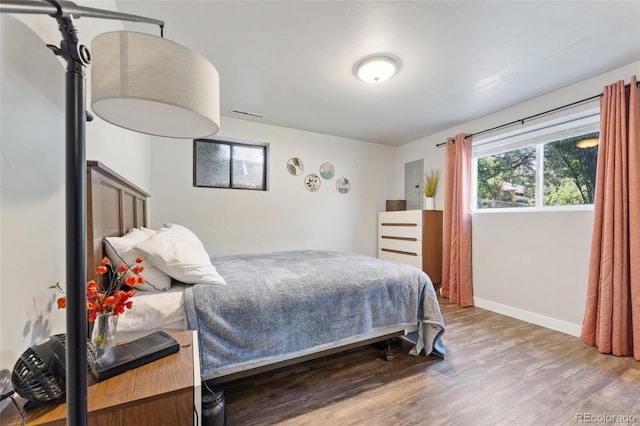 6170 Castlewood Ln, Colorado Springs, CO 80918 - bedroom featuring wood finished floors and electric panel