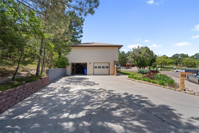 6170 Castlewood Ln, Colorado Springs, CO 80918 - view of property exterior with a garage and driveway