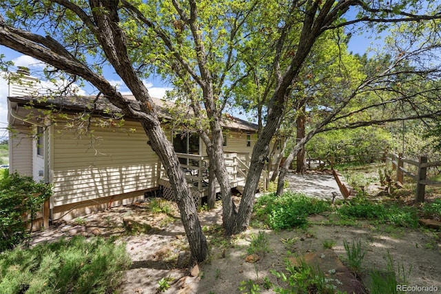 6170 Castlewood Ln, Colorado Springs, CO 80918 - view of yard with a wooden deck