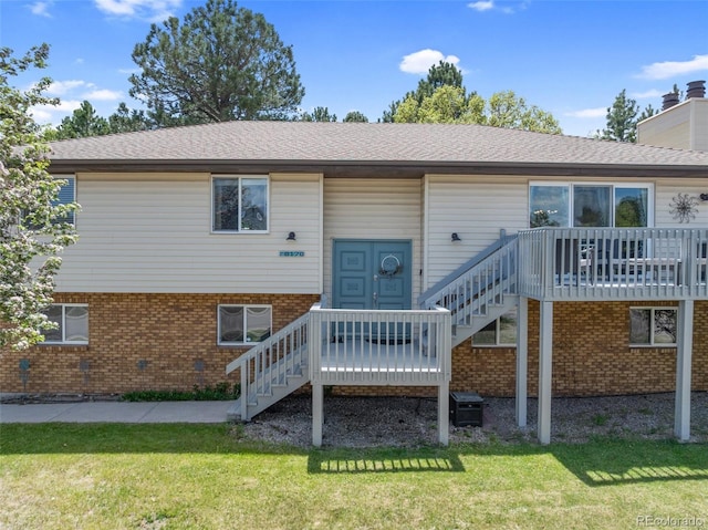 6170 Castlewood Ln, Colorado Springs, CO 80918 - back of property with stairway, brick siding, and a wooden deck