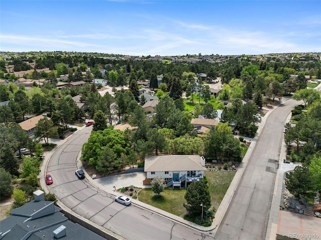6170 Castlewood Ln, Colorado Springs, CO 80918 - aerial view of residential area featuring a tree filled landscape