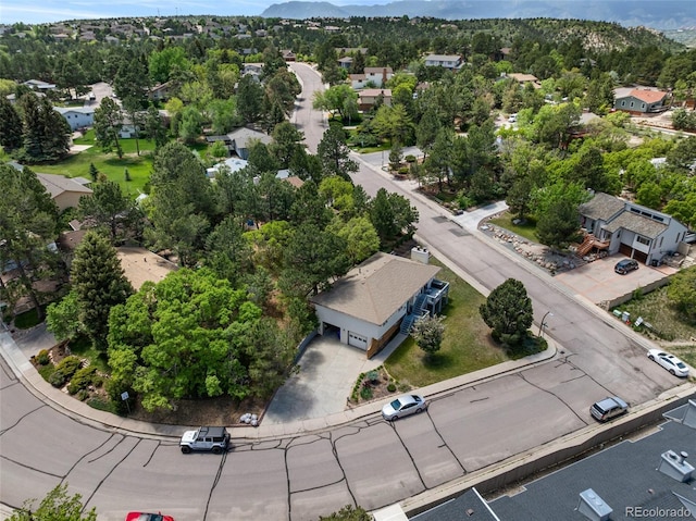 6170 Castlewood Ln, Colorado Springs, CO 80918 - aerial perspective of suburban area with a mountain backdrop
