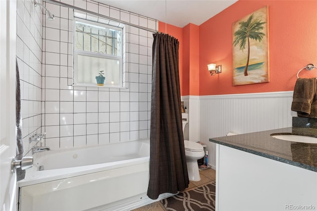 34 W Maple Ave, Denver, CO 80223 - full bath with shower / tub combo, vanity, wainscoting, and tile patterned floors