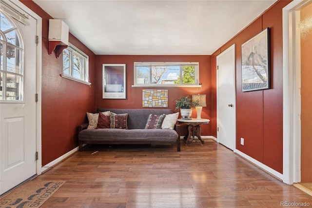 34 W Maple Ave, Denver, CO 80223 - sitting room featuring wood finished floors and plenty of natural light