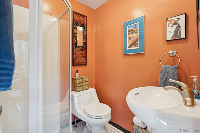 34 W Maple Ave, Denver, CO 80223 - full bath featuring a stall shower and tile patterned floors