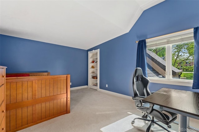 6901 E 12th Ave, Denver, CO 80220 - home office featuring lofted ceiling, carpet floors, and baseboards