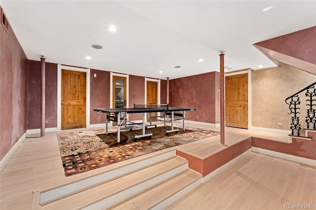 6901 E 12th Ave, Denver, CO 80220 - recreation room with wood finished floors, recessed lighting, and baseboards