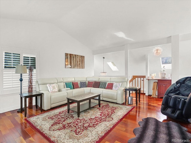 3596 S Telluride Way, Aurora, CO 80013 - living area featuring wood finished floors and lofted ceiling
