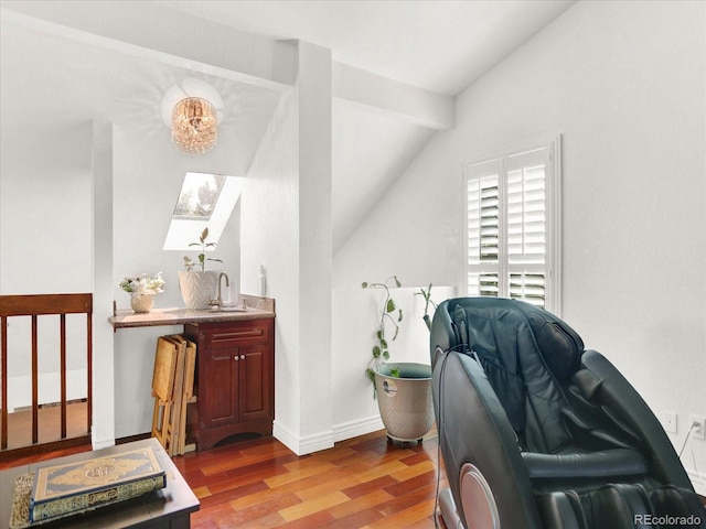3596 S Telluride Way, Aurora, CO 80013 - office space featuring lofted ceiling, wood finished floors, and a skylight