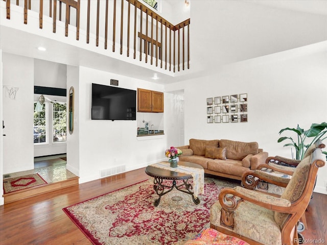 3596 S Telluride Way, Aurora, CO 80013 - living room with wood finished floors and a high ceiling