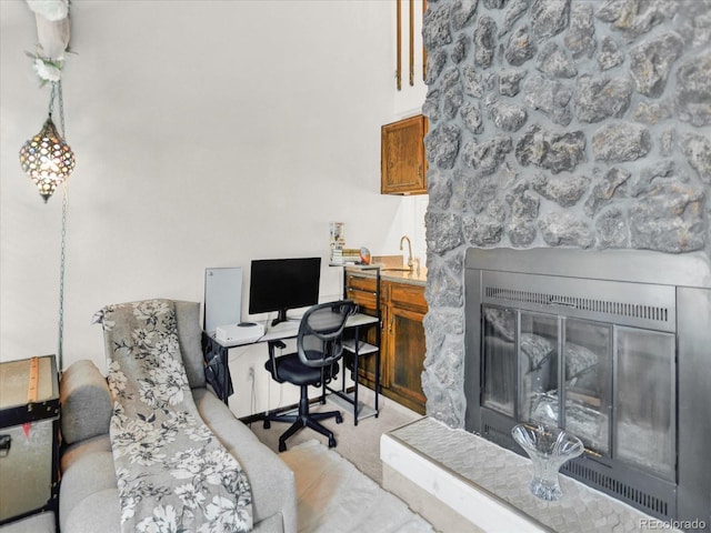 3596 S Telluride Way, Aurora, CO 80013 - office featuring a stone fireplace and carpet