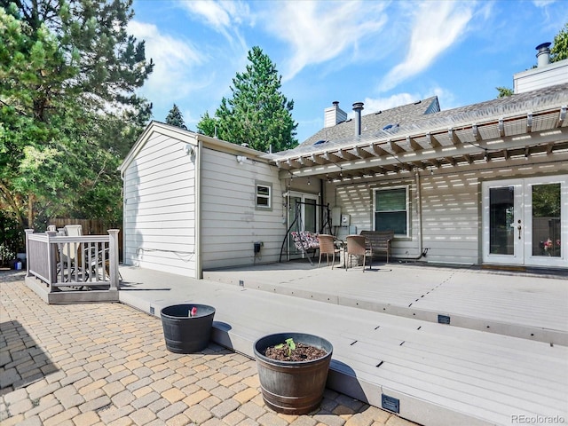 3596 S Telluride Way, Aurora, CO 80013 - view of patio featuring a wooden deck, a pergola, french doors, and outdoor dining space