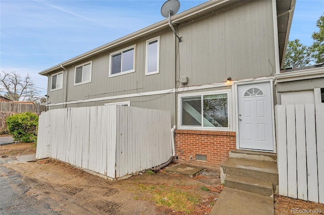 1344 Sable Blvd, Aurora, CO 80011 - exterior space featuring entry steps, brick siding, and fence