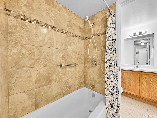 bathroom featuring tile patterned flooring, shower / bath combination with curtain, and vanity