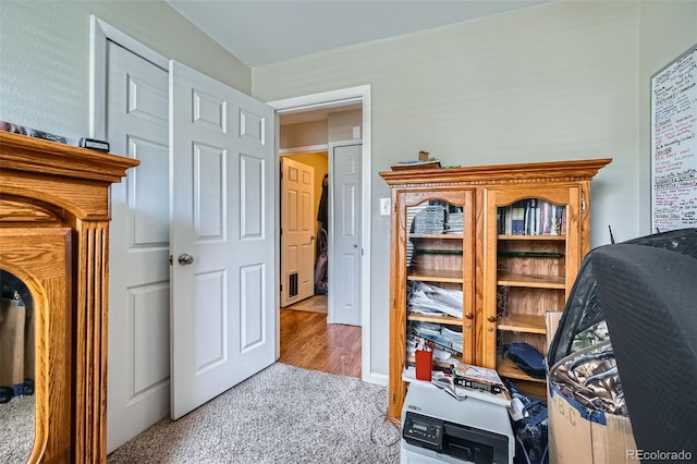 bedroom featuring light carpet