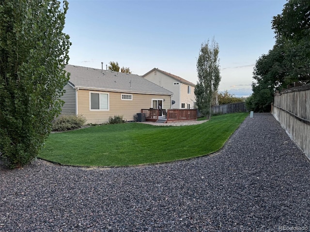 view of yard with central AC unit