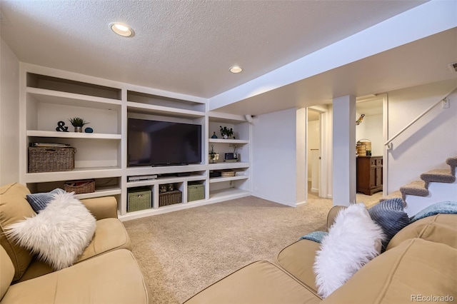 living room featuring light colored carpet, built in features, and a textured ceiling