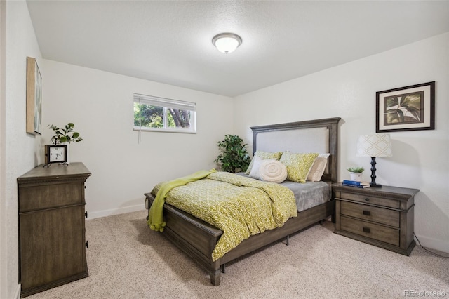 6193 Holland St, Arvada, CO 80004 - bedroom featuring light carpet and baseboards