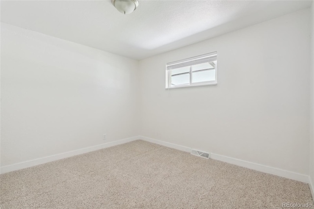 6193 Holland St, Arvada, CO 80004 - carpeted spare room featuring baseboards