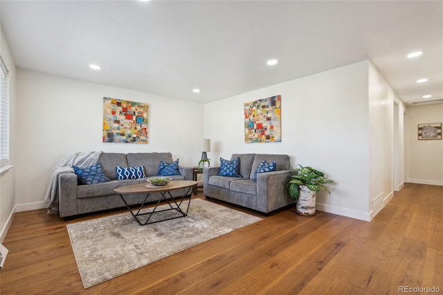 6193 Holland St, Arvada, CO 80004 - living room featuring hardwood / wood-style flooring and recessed lighting