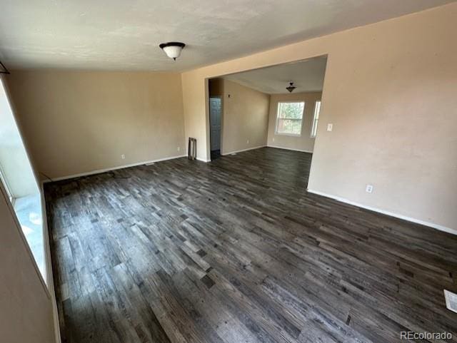 13193 E US Highway 160, Alamosa, CO 81101 - empty room with dark wood-type flooring