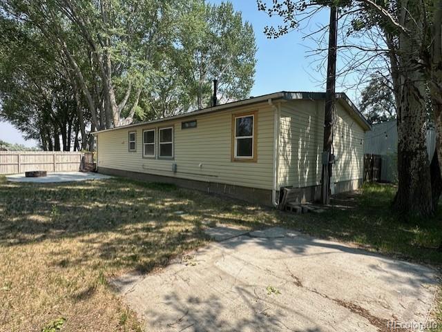 13193 E US Highway 160, Alamosa, CO 81101 - rear view of property featuring a patio