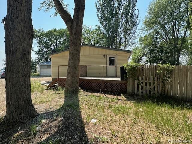 13193 E US Highway 160, Alamosa, CO 81101 - back of house with a wooden deck