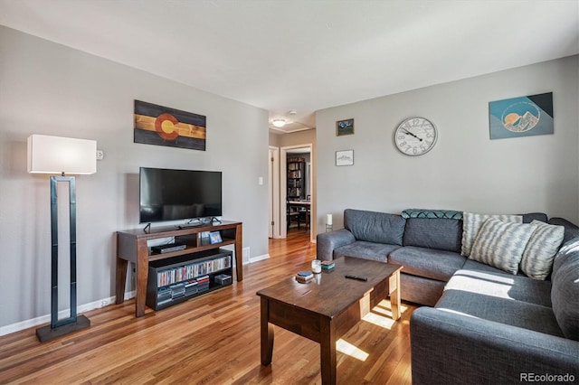 3995 Nelson St, Wheat Ridge, CO 80033 - living room with wood finished floors and baseboards