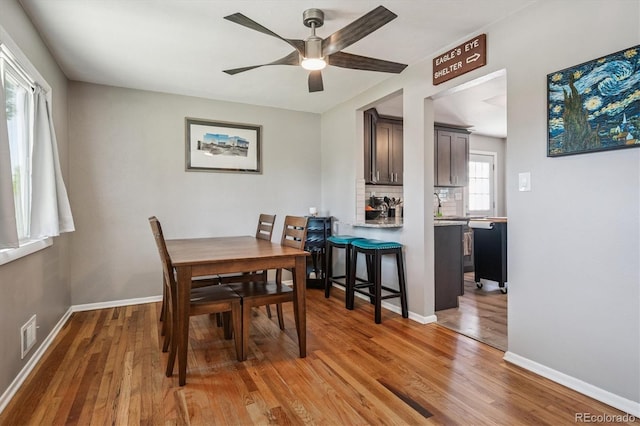 3995 Nelson St, Wheat Ridge, CO 80033 - dining area featuring light wood-style flooring and ceiling fan