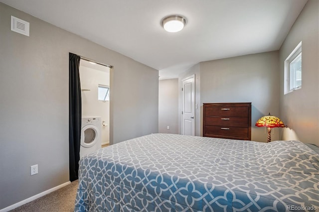 3995 Nelson St, Wheat Ridge, CO 80033 - bedroom featuring washer / dryer and carpet