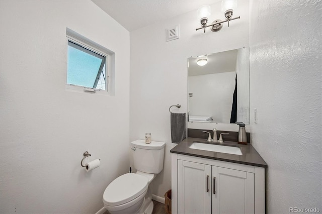 3995 Nelson St, Wheat Ridge, CO 80033 - half bathroom with vanity and toilet