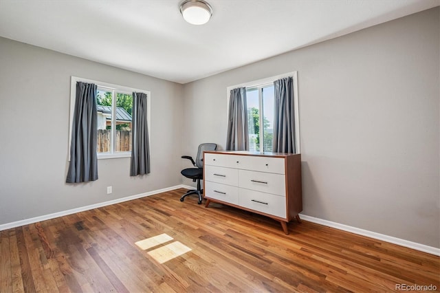 3995 Nelson St, Wheat Ridge, CO 80033 - bedroom featuring light wood-style flooring and baseboards