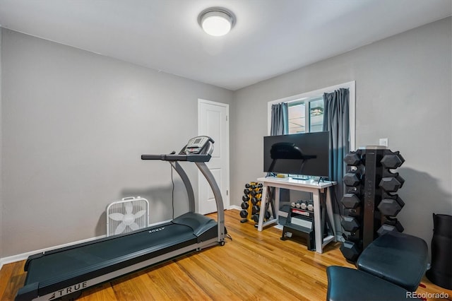 3995 Nelson St, Wheat Ridge, CO 80033 - workout room featuring wood finished floors and baseboards