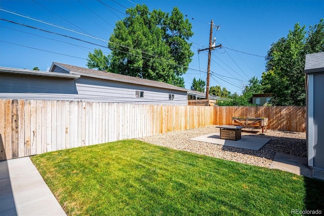 3995 Nelson St, Wheat Ridge, CO 80033 - fenced backyard with a patio