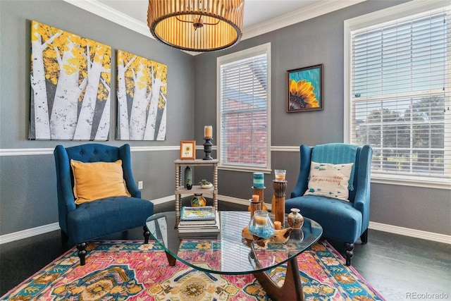 living area with ornamental molding and hardwood / wood-style floors