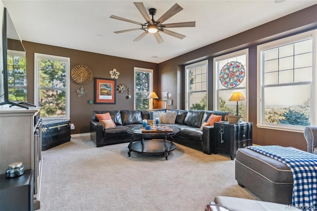 living room with carpet flooring and ceiling fan