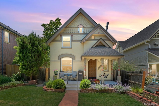 2829 N Franklin St, Denver, CO 80205 - victorian home featuring covered porch and a shingled roof