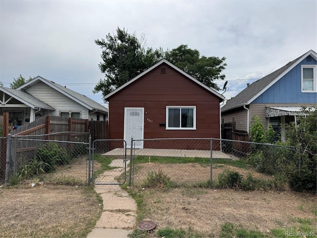 4807 Clayton St, Denver, CO 80216 - bungalow-style house featuring a gate