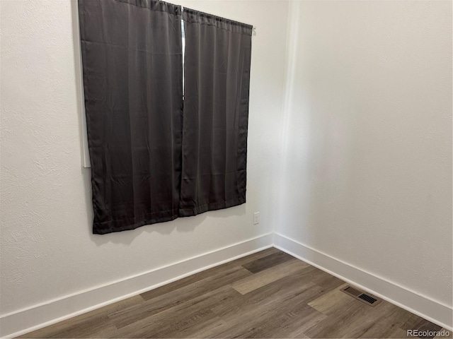 4807 Clayton St, Denver, CO 80216 - detailed view of wood finished floors and baseboards