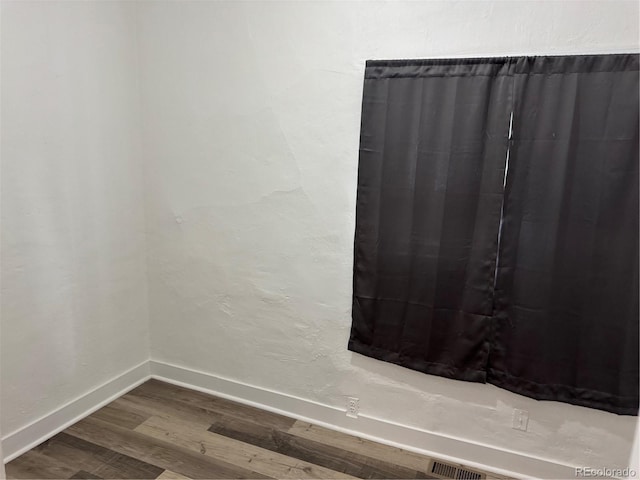 4807 Clayton St, Denver, CO 80216 - detailed view of wood finished floors and baseboards